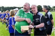 7 September 2019; Dementia advocate Kevin Quaid gives Kilkenny referee Seán Cleere a suspicious brown Envelope before The Alzheimer Society of Ireland hosting Bluebird Care sponsored Tipperary v Limerick hurling fundraiser match at Nenagh Éire Óg, Nenagh, Co Tipperary. This unique fundraising initiative, to mark World Alzheimer’s Month 2019, was the brainchild of two leading Munster dementia advocates, Kevin Quaid and Kathy Ryan, who both have a dementia diagnosis. All the money raised will go towards providing community services and advocacy supports in the Munster area and beyond. Photo by Piaras Ó Mídheach/Sportsfile