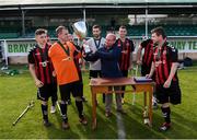 7 September 2019; Bohemians captain James Conroy is presented with the cup by Colm Young, FAI Senior Council Representative for Football For All, following the Megazyme Amputee Football League Cup Finals at Carlisle Grounds in Bray, Co Wicklow. Photo by Stephen McCarthy/Sportsfile