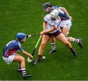 8 September 2019; Dervla Higgins of Galway in action against Laura Doherty, left, and Mairead McCormack of Westmeath during the Liberty Insurance All-Ireland Intermediate Camogie Championship Final match between Galway and Westmeath at Croke Park in Dublin. Photo by Ramsey Cardy/Sportsfile