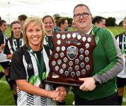 8 September 2019; Whitehall Rangers captain Charlie Graham is presented with the trophy by Derek Collins, FAI Women's Council, following the FAI Women’s Intermediate Shield Final match between Manulla FC and Whitehall Rangers at Mullingar Athletic FC in Mullingar, Co. Westmeath. Photo by Seb Daly/Sportsfile