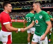 7 September 2019; Josh Adams of Wales, left, and Jonathan Sexton of Ireland after the Guinness Summer Series match between Ireland and Wales at Aviva Stadium in Dublin. Photo by Brendan Moran/Sportsfile