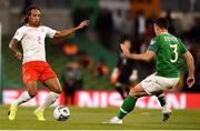 5 September 2019; Kevin Mbabu of Switzerland and Enda Stevens of Republic of Ireland during the UEFA EURO2020 Qualifier Group D match between Republic of Ireland and Switzerland at Aviva Stadium, Lansdowne Road in Dublin. Photo by Ben McShane/Sportsfile