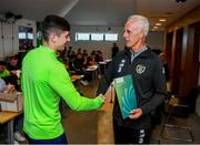 9 September 2019; Republic of Ireland manager Mick McCarthy presents Dylan Reilly of the DDLETB Training Centre, Loughlinstown, with their certificate during the 2019 FAI-ETB Graduation event at the FAI Headquarters in Abbotstown, Dublin. Photo by Stephen McCarthy/Sportsfile