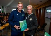 9 September 2019; Republic of Ireland manager Mick McCarthy presents Sam Rennicks of the DDLETB Training Centre, Loughlinstown, with their certificate during the 2019 FAI-ETB Graduation event at the FAI Headquarters in Abbotstown, Dublin. Photo by Stephen McCarthy/Sportsfile