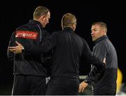 9 September 2019; Waterford United manager Alan Reynolds, right, and Dundalk head coach Vinny Perth, centre, exchange words while being watched by fourth official Andrew Mullally during the Extra.ie FAI Cup Quarter-Final match between Waterford and Dundalk at the Waterford Regional Sports Centre in Waterford. Photo by Seb Daly/Sportsfile