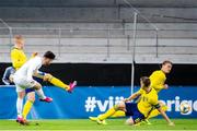 10 September 2019; Aaron Connolly of Republic of Ireland takes a shot under pressure from Mattias Svanberg and Hugo Andersson of Sweden during the UEFA European U21 Championship Qualifier Group 1 match between Sweden and Republic of Ireland at Guldfågeln Arena in Hansa City, Kalmar, Sweden. Photo by Suvad Mrkonjic/Sportsfile