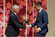 13 September 2019; Conor Murray is presented with his RWC2019 cap by Deputy CEO of the Rugby World Cup Organising Committee Gerald Davies during the Ireland Rugby World Cup 2019 Welcome Ceremony at Mihama Bunka Hall Hall in Chiba Prefecture, Japan. Photo by Brendan Moran/Sportsfile