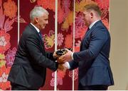 13 September 2019; Tadhg Furlong is presented with his RWC2019 cap by Deputy CEO of the Rugby World Cup Organising Committee Gerald Davies during the Ireland Rugby World Cup 2019 Welcome Ceremony at Mihama Bunka Hall Hall in Chiba Prefecture, Japan. Photo by Brendan Moran/Sportsfile