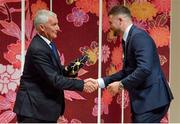 13 September 2019; Robbie Henshaw is presented with his RWC2019 cap by Deputy CEO of the Rugby World Cup Organising Committee Gerald Davies during the Ireland Rugby World Cup 2019 Welcome Ceremony at Mihama Bunka Hall Hall in Chiba Prefecture, Japan. Photo by Brendan Moran/Sportsfile