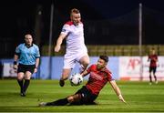 13 September 2019; Chris Lyons of Drogheda United puts in a tackle on Lorcan Fitzgerald of Shelbourne during the SSE Airtricity League First Division match between Drogheda United and Shelbourne at United Park in Drogheda, Louth.  Photo by Stephen McCarthy/Sportsfile