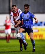 13 September 2019; Harry McEvoy of UCD in action against Ronan Hale of St Patricks Athletic during the SSE Airtricity League Premier Division match between St Patrick's Athletic and UCD at Richmond Park in Dublin.  Photo by Sam Barnes/Sportsfile