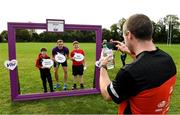 14 September 2019; Niall Harmon from Navan takes a picture of his sons, 9 year Ryan and 10 year old Luke with David Gillick, pictured at the Navan parkrun at Blackwater Park, in Navan, Co. Meath, where Vhi hosted a special event to celebrate their partnership with parkrun Ireland. Vhi ambassador and Olympian David Gillick was on hand to lead the warm up for parkrun participants before completing the 5km free event. Parkrunners enjoyed refreshments post event at the Vhi Rehydrate, Relax, Refuel and Reward areas. Parkrun in partnership with Vhi support local communities in organising free, weekly, timed 5k runs every Saturday at 9.30am. To register for a parkrun near you visit www.parkrun.ie. Photo by Matt Browne/Sportsfile