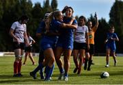 14 September 2019; Megan Williams, centre, of Leinster celebrates after scoring her side's third try with team-mates Sene Naoupu, right, and Linda Djougang during the Women’s Interprovincial Championship Semi-Final match between Leinster and Ulster at St Mary's RFC in Templeogue, Dublin. Photo by Ben McShane/Sportsfile