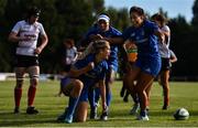 14 September 2019; Megan Williams, centre, of Leinster celebrates after scoring her side's third try with team-mates Sene Naoupu, right, and Linda Djougang during the Women’s Interprovincial Championship Semi-Final match between Leinster and Ulster at St Mary's RFC in Templeogue, Dublin. Photo by Ben McShane/Sportsfile