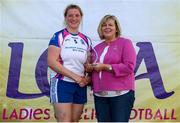 14 September 2019; Marie Hickey, President, LGFA, makes a presentation to Katie Bourke runners-up in the Intermediate Championship to Abbeyside, Co Waterford United during the 2019 LGFA All-Ireland Club 7s at Naomh Mearnóg & St Sylvesters in Dublin. Photo by Michael P Ryan/Sportsfile