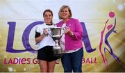 14 September 2019; Marie Hickey, President, LGFA, presents Aoife McAnespie of Emyvale, Co Monaghan with the Senior Championship Final trophy after they beat The Banner, Co Clare during the 2019 LGFA All-Ireland Club 7s at Naomh Mearnóg & St Sylvesters in Dublin. Photo by Michael P Ryan/Sportsfile