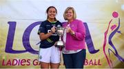 14 September 2019; Marie Hickey, President, LGFA, presents Deirdre Brennan of Claregalway, Co Galway with the Senior Shield Final trophy after they beat Bryansford, Co Down during the 2019 LGFA All-Ireland Club 7s at Naomh Mearnóg & St Sylvesters in Dublin. Photo by Michael P Ryan/Sportsfile