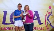 14 September 2019; Marie Hickey, President, LGFA, presents the Abbeyside, Co Waterford United Captain with the Intermediate Championship Final trophy after they beat Templemore, Co Tipperary during the 2019 LGFA All-Ireland Club 7s at Naomh Mearnóg & St Sylvesters in Dublin. Photo by Michael P Ryan/Sportsfile