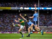 14 September 2019; David Moran of Kerry attempts to kick a point under pressure from Brian Fenton and Philip McMahon of Dublin during the GAA Football All-Ireland Senior Championship Final Replay match between Dublin and Kerry at Croke Park in Dublin. Photo by Seb Daly/Sportsfile