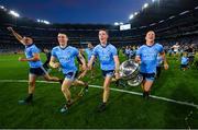 14 September 2019; Dublin players, from left, Brian Howard, John Small, Brian Fenton and Ciarán Kilkenny celebrates with the Sam Maguire Cup following the GAA Football All-Ireland Senior Championship Final Replay between Dublin and Kerry at Croke Park in Dublin. Photo by Seb Daly/Sportsfile