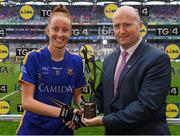 15 September 2019; Aishling Moloney of Tipperary, is presented with the player of the match award by Rónán Ó Coisdealbha, Head of Sport, TG4, during the TG4 All-Ireland Ladies Football Intermediate Championship Final match between Meath and Tipperary at Croke Park in Dublin. Photo by Ramsey Cardy/Sportsfile