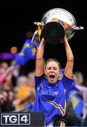 15 September 2019; Tipperary captain Samantha Lambert lifts the the Mary Quinn Memorial Cup after the TG4 All-Ireland Ladies Football Intermediate Championship Final match between Meath andTipperary at Croke Park in Dublin. Photo by Piaras Ó Mídheach/Sportsfile