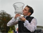15 September 2019; Jockey Chris Hayes with the trophy after winning the Comer Group International Irish St Leger on Search For A Song during Day Two of the Irish Champions Weekend at The Curragh Racecourse in Kildare. Photo by Seb Daly/Sportsfile