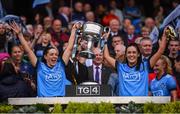 15 September 2019; Sinéad Goldrick, left, and Hannah O'Neill of Dublin lift the Brendan Martin Cup following the TG4 All-Ireland Ladies Football Senior Championship Final match between Dublin and Galway at Croke Park in Dublin. Photo by Stephen McCarthy/Sportsfile