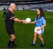 15 September 2019; Molly Murphy of St Patrick's, Co Louth, presents the match ball to referee Kevin Phelan prior to the TG4 All-Ireland Ladies Football Junior Championship Final match between Fermanagh and Louth at Croke Park in Dublin. Photo by Stephen McCarthy/Sportsfile