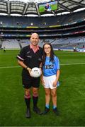 15 September 2019; Molly Murphy of St Patrick's, Co Louth, presents the match ball to referee Kevin Phelan prior to the TG4 All-Ireland Ladies Football Junior Championship Final match between Fermanagh and Louth at Croke Park in Dublin. Photo by Stephen McCarthy/Sportsfile