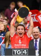 15 September 2019; Ceire Nolan of Louth lifts the West County Hotel Cup following the TG4 All-Ireland Ladies Football Junior Championship Final match between Fermanagh and Louth at Croke Park in Dublin. Photo by Stephen McCarthy/Sportsfile