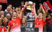 15 September 2019; Dearbhla O'Connor, left, and Seoda Matthews of Louth lift the West County Hotel Cup following the TG4 All-Ireland Ladies Football Junior Championship Final match between Fermanagh and Louth at Croke Park in Dublin. Photo by Stephen McCarthy/Sportsfile