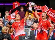 15 September 2019; Aoife Byrne, left, and Eimear Byrne of Louth lift the West County Hotel Cup following the TG4 All-Ireland Ladies Football Junior Championship Final match between Fermanagh and Louth at Croke Park in Dublin. Photo by Stephen McCarthy/Sportsfile