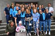 16 September 2019; Dublin footballer Rachel Ruddy, centre, with the Brendan Martin Cup alongside her fellow team-mates and staff members and patients Kate Cullivan, age 11, from Naas, Co Kildare, right, and Rachel Knight, age 5, from Donabate, Co Dublin during the TG4 All-Ireland Senior Ladies Football Champions visit to Our Lady’s Children’s Hospital in Crumlin, Co Dublin. Photo by David Fitzgerald/Sportsfile
