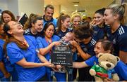 16 September 2019; Dublin ladies footballers including Hannah O'Neill, centre, and Lyndsey Davey, left, with nurses and James Ryan, age 6 months, inside the Brendan Martin cup during the TG4 All-Ireland Senior Ladies Football Champions visit to Our Lady’s Children’s Hospital in Crumlin, Co Dublin. Photo by David Fitzgerald/Sportsfile
