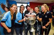 16 September 2019; Dublin ladies footballers, from left, Ciara Trant, Oonagh Whyte, Lyndsey Davey and Nicole Owens with Darragh Carroll, age 10 months, from Kilnamanagh, Co Dublin during the TG4 All-Ireland Senior Ladies Football Champions visit to Our Lady’s Children’s Hospital in Crumlin, Co Dublin. Photo by David Fitzgerald/Sportsfile