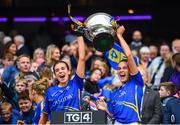 15 September 2019; Tipperary's Anna Rose Kennedy, left, and Caitlín Kennedy lift the Mary Quinn Memorial Cup following the TG4 All-Ireland Ladies Football Intermediate Championship Final match between Meath and Tipperary at Croke Park in Dublin. Photo by Stephen McCarthy/Sportsfile