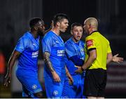 16 September 2019; Crumlin players, from left, Blair Mandiangu, Conor Murphy and Noel Cummins remonstrate with referee Graham Kelly during the Extra.ie FAI Cup Quarter-Final match between Crumlin United and Bohemians at Richmond Park in Dublin. Photo by Seb Daly/Sportsfile