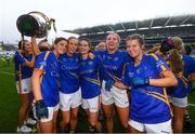 15 September 2019; Tipperary players, from left, Anna Rose Kennedy, Samantha Lambert, Maria Curley, Orla O'Dwyer and Laura Dillon celebrate with the Mary Quinn Memorial Cup following the TG4 All-Ireland Ladies Football Intermediate Championship Final match between Meath and Tipperary at Croke Park in Dublin. Photo by Stephen McCarthy/Sportsfile