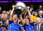 15 September 2019; Tipperary's Emma Morrissey, left, and Muireann Lloyd lift the Mary Quinn Memorial Cup following the TG4 All-Ireland Ladies Football Intermediate Championship Final match between Meath and Tipperary at Croke Park in Dublin. Photo by Stephen McCarthy/Sportsfile