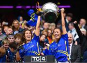 15 September 2019; Tipperary's Elaine Fitzpatrick, left, and Niamh Martin lift the Mary Quinn Memorial Cup following the TG4 All-Ireland Ladies Football Intermediate Championship Final match between Meath and Tipperary at Croke Park in Dublin. Photo by Stephen McCarthy/Sportsfile