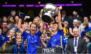 15 September 2019; Tipperary's Laura Dillon, left, and Caoimhe Condon lift the Mary Quinn Memorial Cup following the TG4 All-Ireland Ladies Football Intermediate Championship Final match between Meath and Tipperary at Croke Park in Dublin. Photo by Stephen McCarthy/Sportsfile