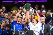 15 September 2019; Tipperary's Katie Cunningham, left, and Rachel Sweeney lift the Mary Quinn Memorial Cup following the TG4 All-Ireland Ladies Football Intermediate Championship Final match between Meath and Tipperary at Croke Park in Dublin. Photo by Stephen McCarthy/Sportsfile