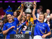 15 September 2019; Tipperary's Emma Buckley, left, and Cora Maher lift the Mary Quinn Memorial Cup following the TG4 All-Ireland Ladies Football Intermediate Championship Final match between Meath and Tipperary at Croke Park in Dublin. Photo by Stephen McCarthy/Sportsfile