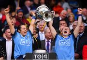 15 September 2019; Kate Fitzgibbon, left, and Muireann Ní Scanaill of Dublin lift the Brendan Martin Cup following the TG4 All-Ireland Ladies Football Senior Championship Final match between Dublin and Galway at Croke Park in Dublin. Photo by Stephen McCarthy/Sportsfile