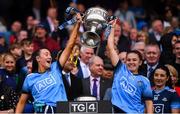 15 September 2019; Niamh Hetherton, left, and Kate Sullivan of Dublin lift the Brendan Martin Cup following the TG4 All-Ireland Ladies Football Senior Championship Final match between Dublin and Galway at Croke Park in Dublin. Photo by Stephen McCarthy/Sportsfile
