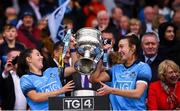 15 September 2019; Siobhán Woods, left, and Lucy Collins of Dublin lift the Brendan Martin Cup following the TG4 All-Ireland Ladies Football Senior Championship Final match between Dublin and Galway at Croke Park in Dublin. Photo by Stephen McCarthy/Sportsfile