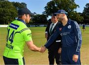17 September 2019; Ireland captain Gary Wilson, left, and Scotland captain Kyle Coetzer shake hands following the coin toss prior to the T20 International Tri Series match between Ireland and Scotland at Malahide Cricket Club in Dublin. Photo by Seb Daly/Sportsfile