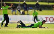 17 September 2019; Gareth Delany of Ireland claims the wicket of Matthew Cross of Scotland, caught and bowled, during the T20 International Tri Series match between Ireland and Scotland at Malahide Cricket Club in Dublin. Photo by Seb Daly/Sportsfile