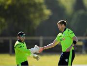 17 September 2019; Boyd Rankin of Ireland, right, is congratulated by team-mate Gary Wilson after claiming the wicket of Oliver Hairs of Scotland during the T20 International Tri Series match between Ireland and Scotland at Malahide Cricket Club in Dublin. Photo by Seb Daly/Sportsfile